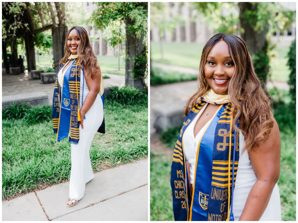 A graduate posing on Notre Dame campus with greenery in the background, photographed by Leah Rife Photo