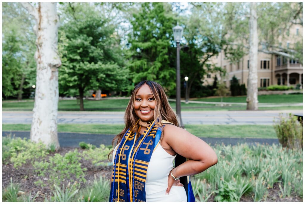 Graduation portrait of Njeri photographed by Leah Rife Photo on the University of Notre Dame campus.
